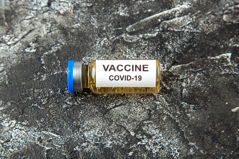 Front view antivirus vaccine in little flask on gray background health science lab pandemic virus covid- isolation
